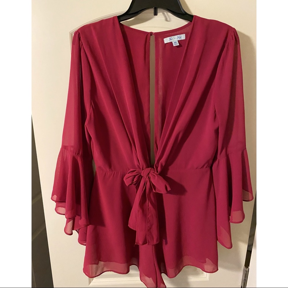 Long-sleeve romper worn once for wedding